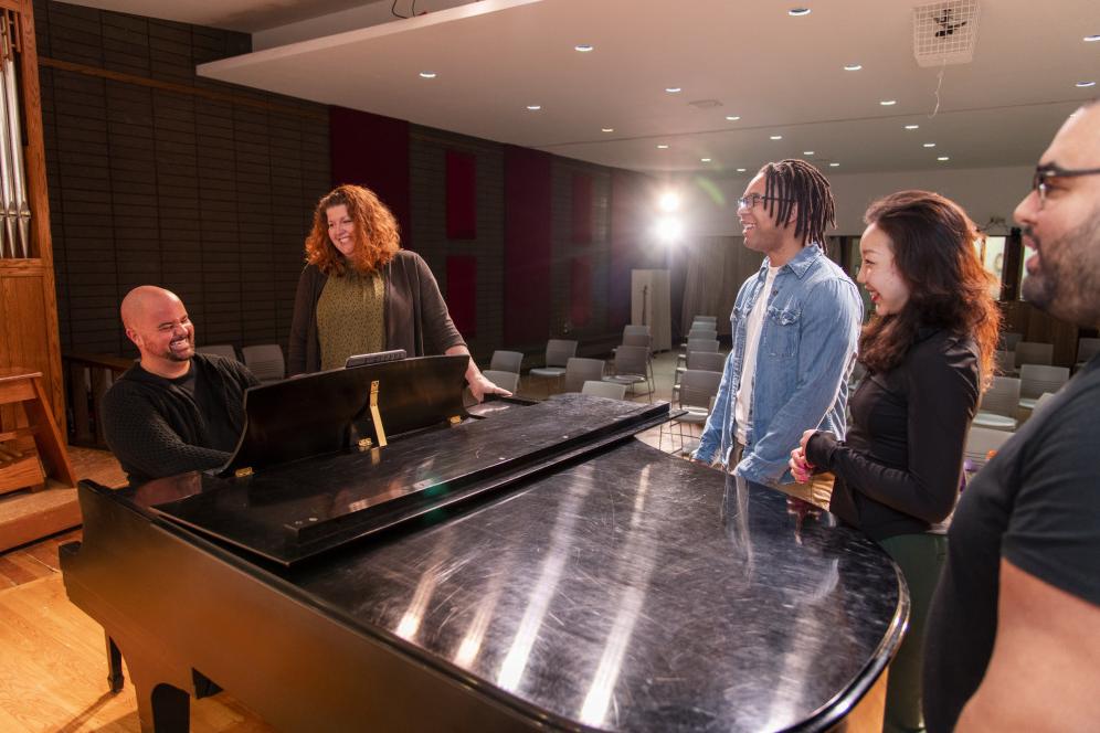 Master of Music students and faculty rehearse in the Recital Hall.